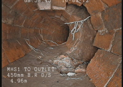 Hole in a brick culvert